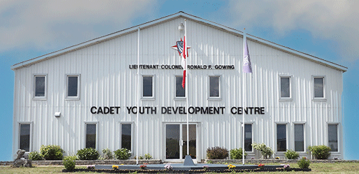 Front view of the Cadet Youth Development Centre building under a blue sky